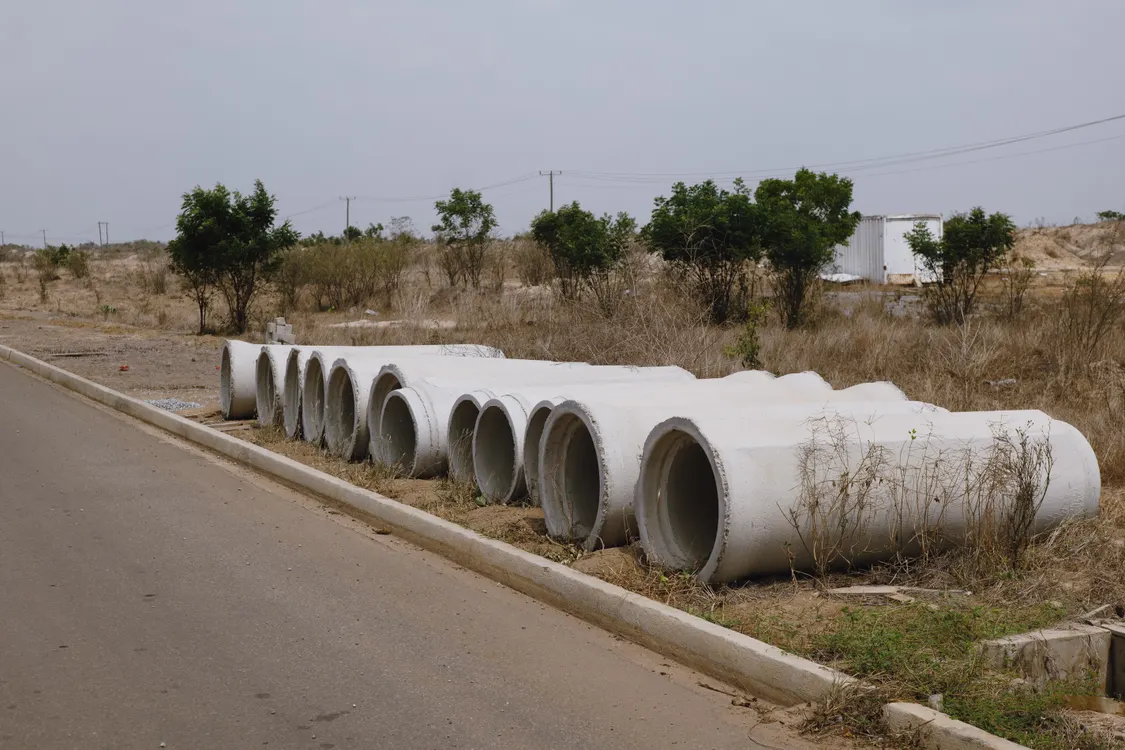 Trenchless Sewer Line Repair Pittsburgh PA — row of concrete pipes beside a road